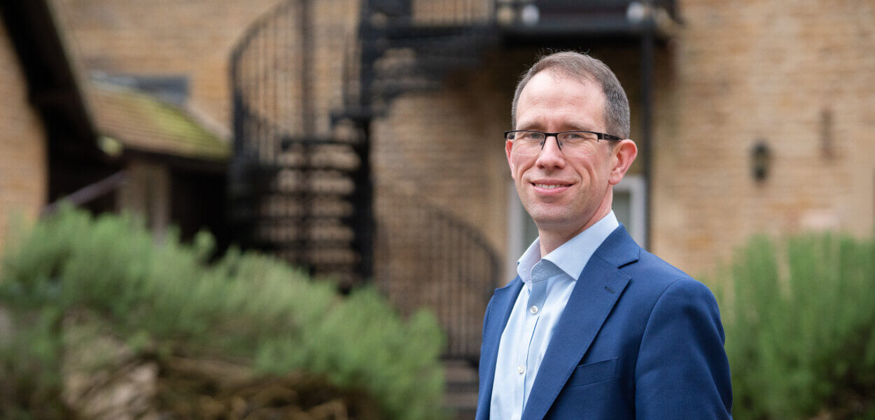 Police and Crime Commissioner Matthew Barber standing outside a building