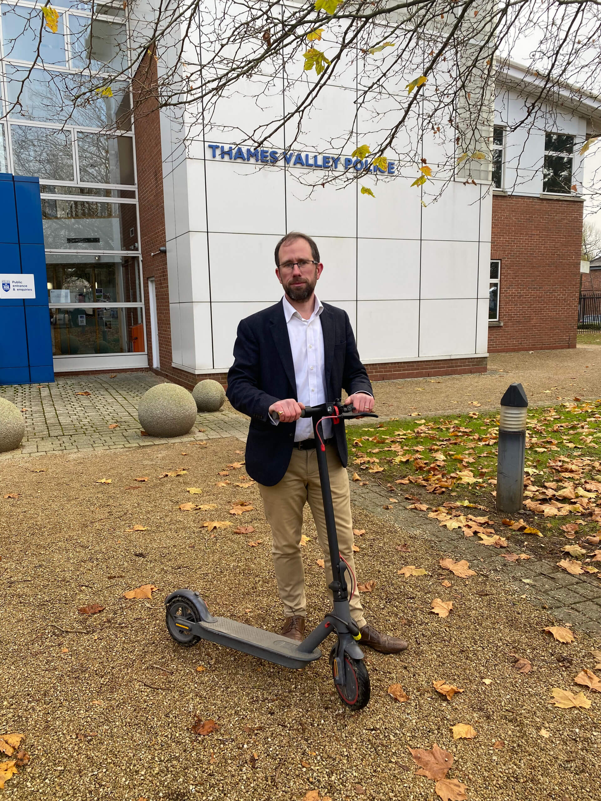 Matthew Barber with an e-scooter