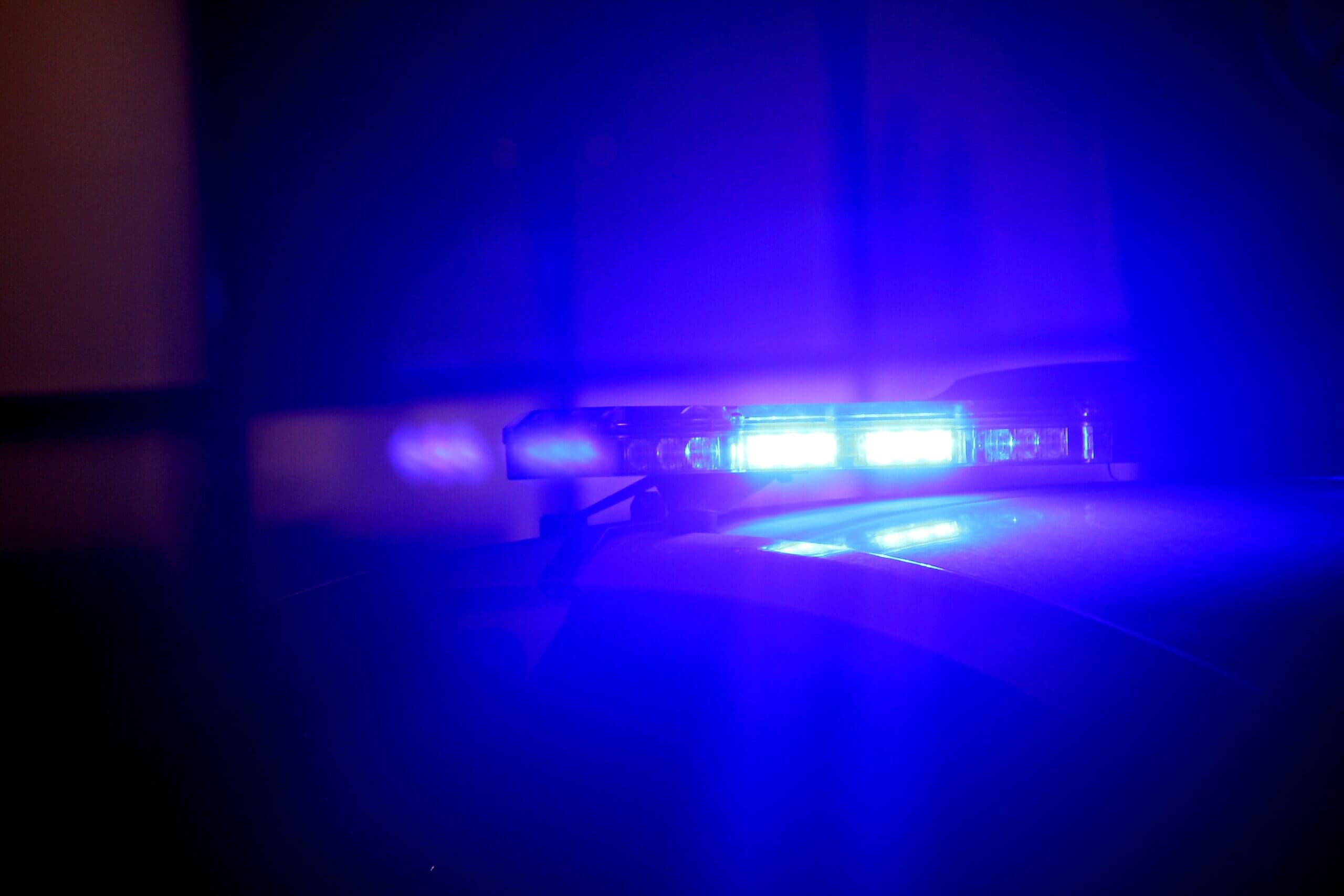 blue police car light in the night