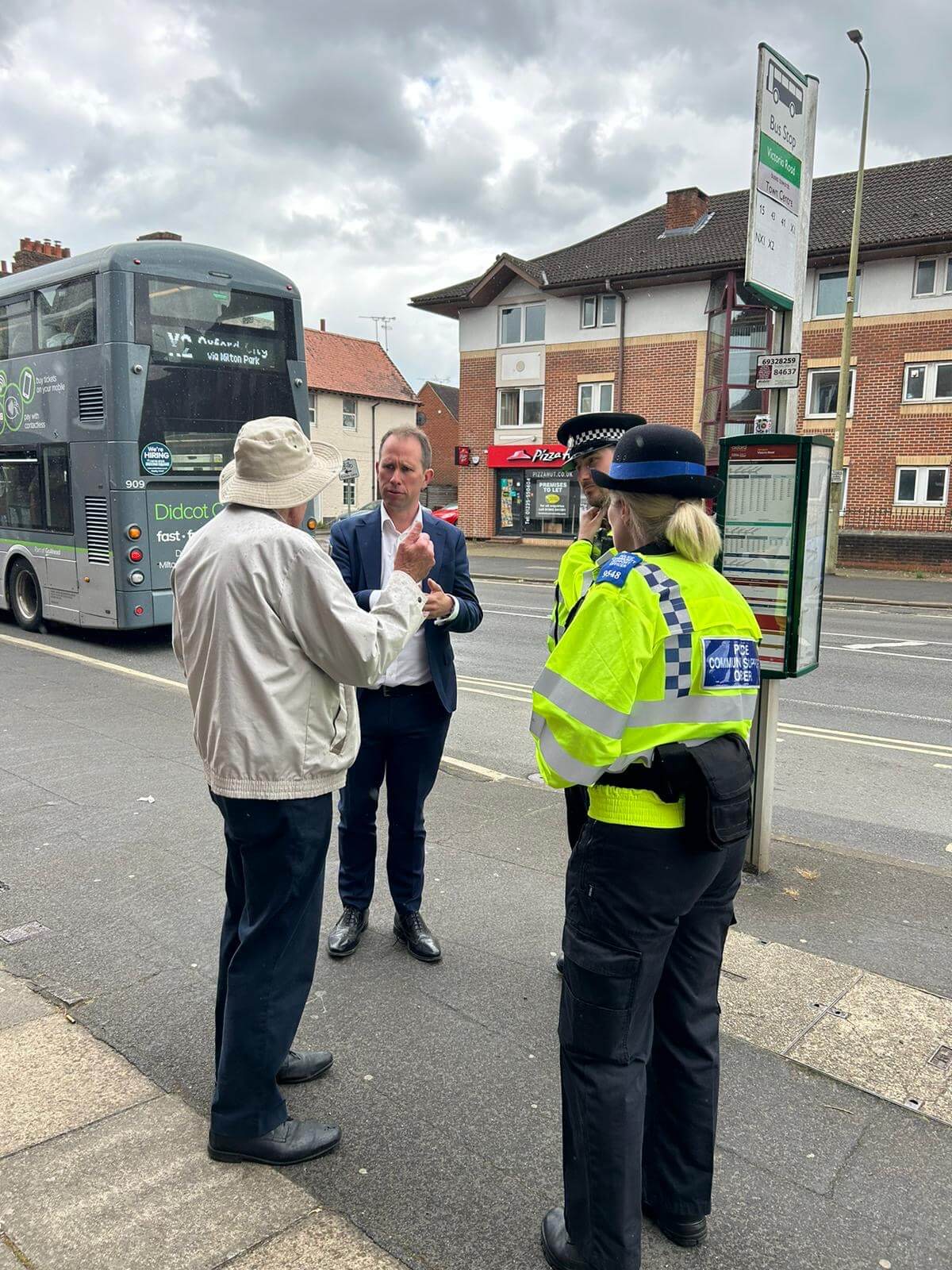 Picture of Matthew Barber speaking to member of the public