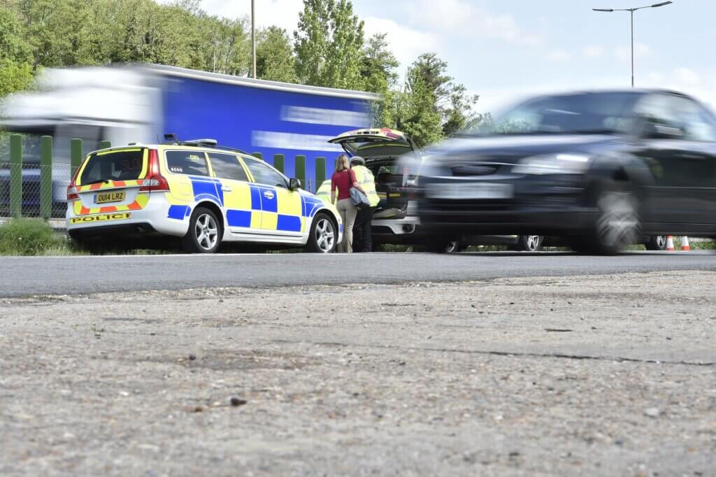 Generic image of police car on busy road