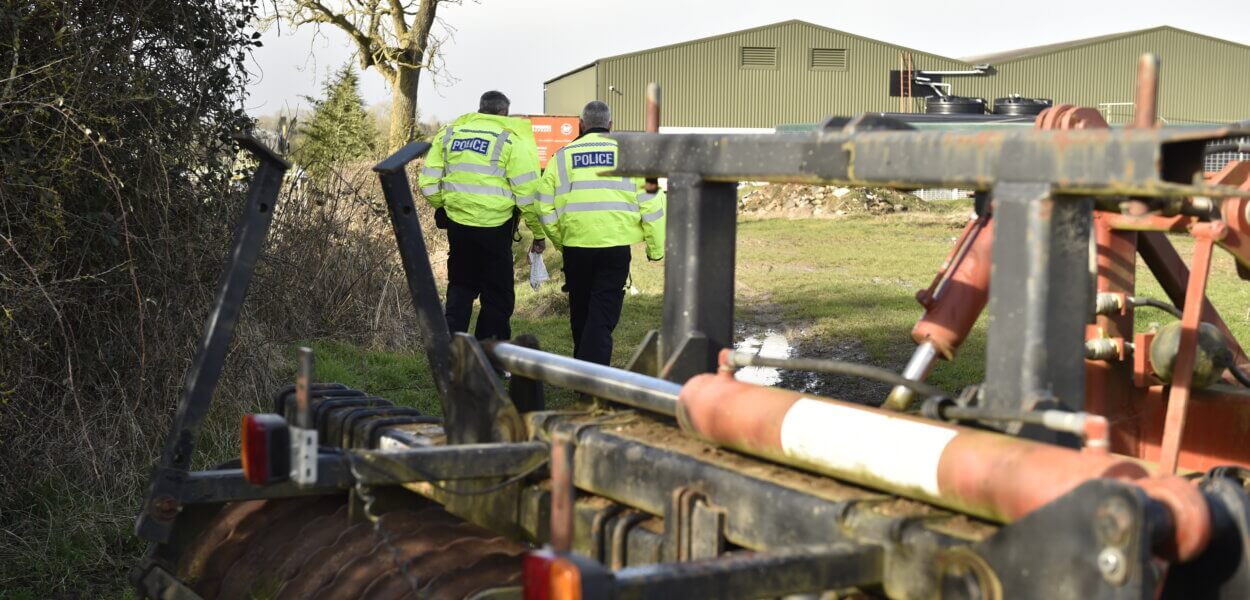 Rural crime officers in farm setting