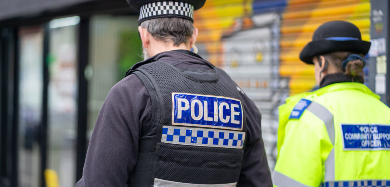 Police officer and PCSO in town centre