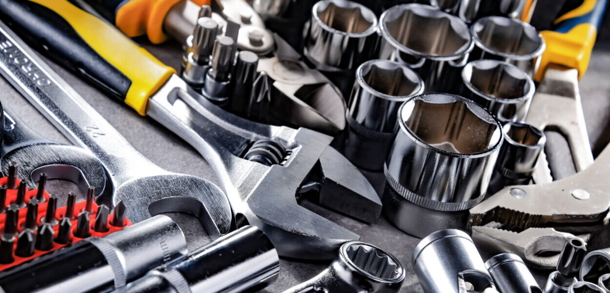 Composition with a variety of metal tools